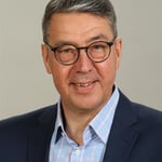 Dr.
